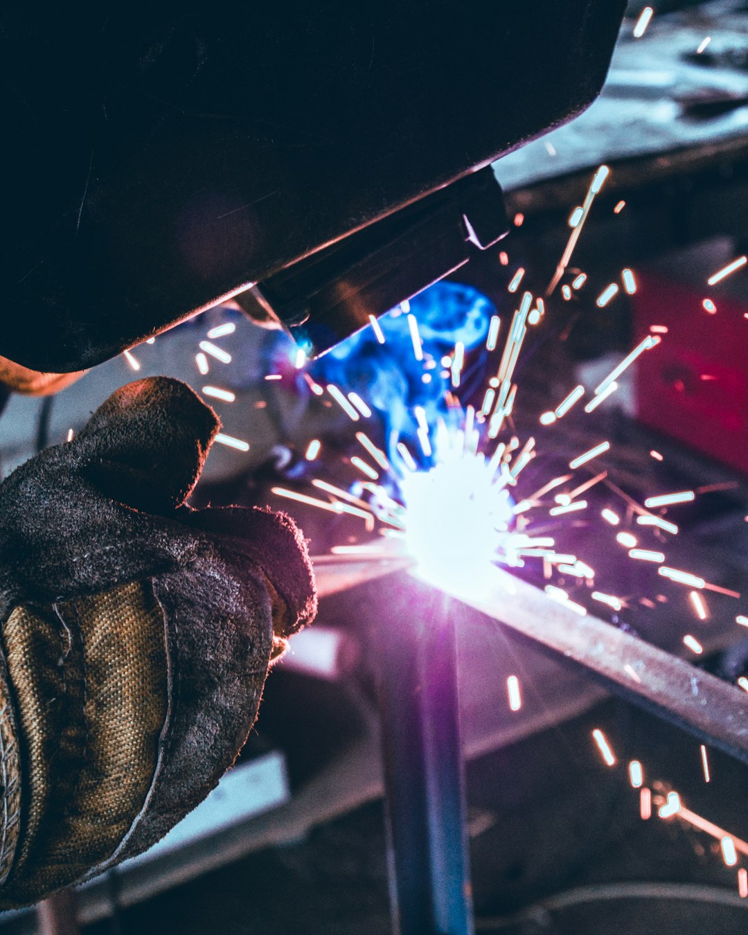 a-welder-working-on-a-piece-of-metal-u3sdlpk3wya